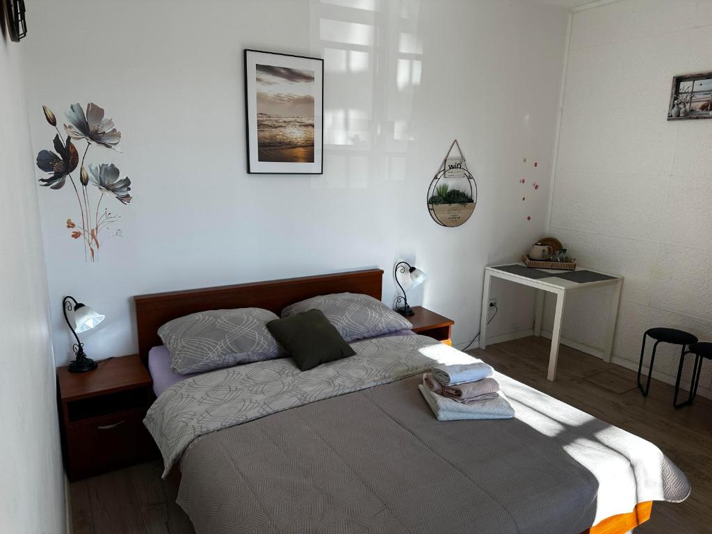 Posteľ alebo postele v izbe v ubytovaní Guesthouse Perica
