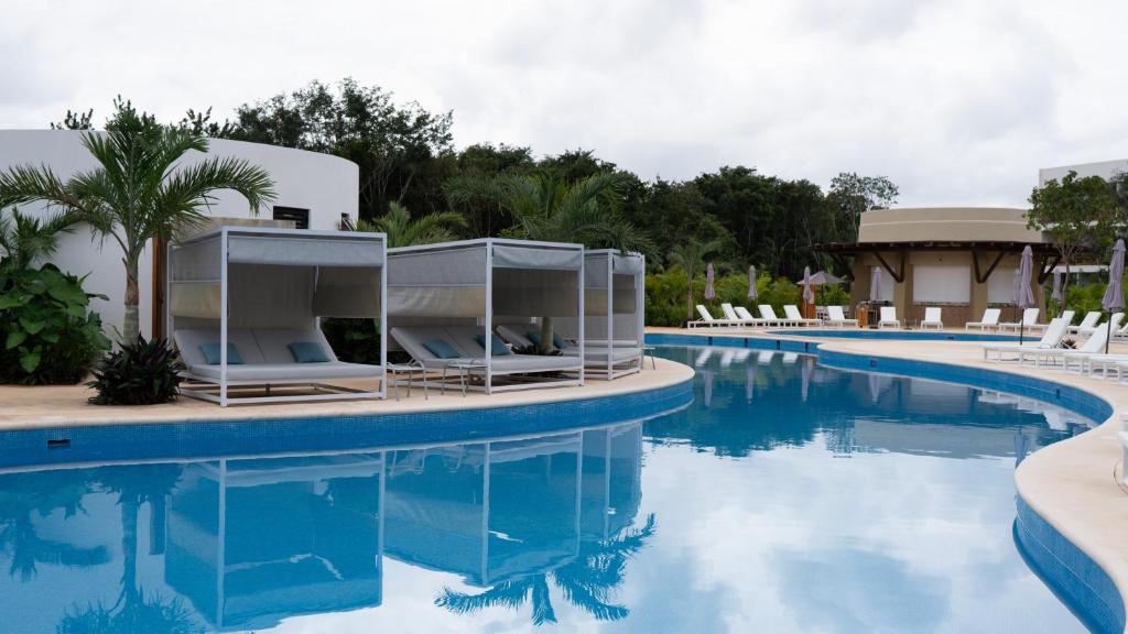 Bazén v ubytování Hotel Mundo Maya Chichén Itzá nebo v jeho okolí