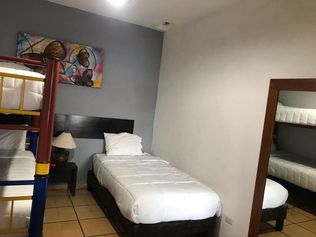 Postel nebo postele na pokoji v ubytování Hotel Gandag