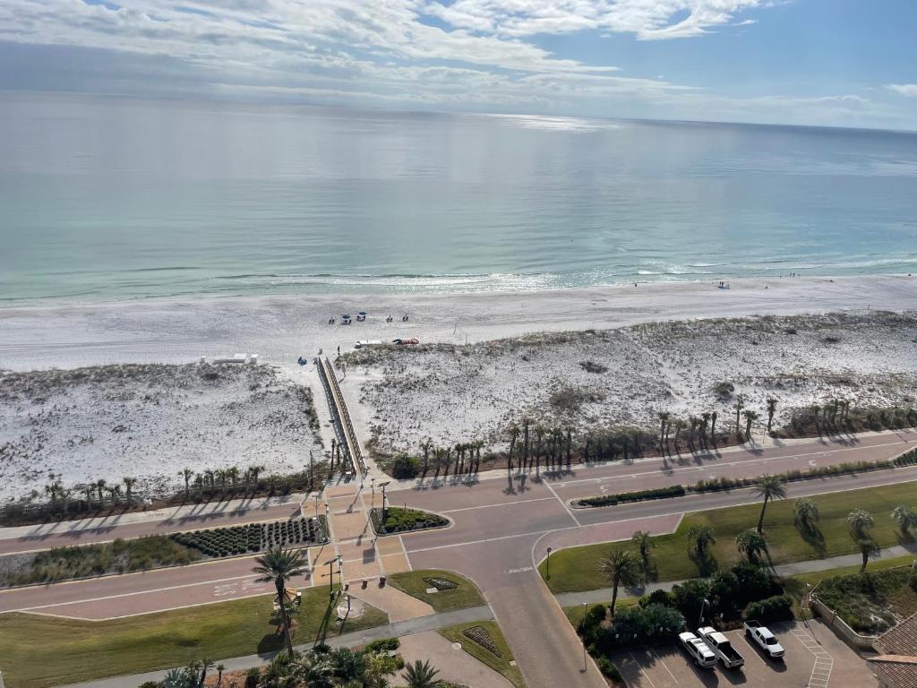 an aerial view of the beach and the ocean at Oceanfront Tower 3 Gulf & Bay View 3-Bedroom 18th Floor Condo in Pensacola Beach in Pensacola Beach