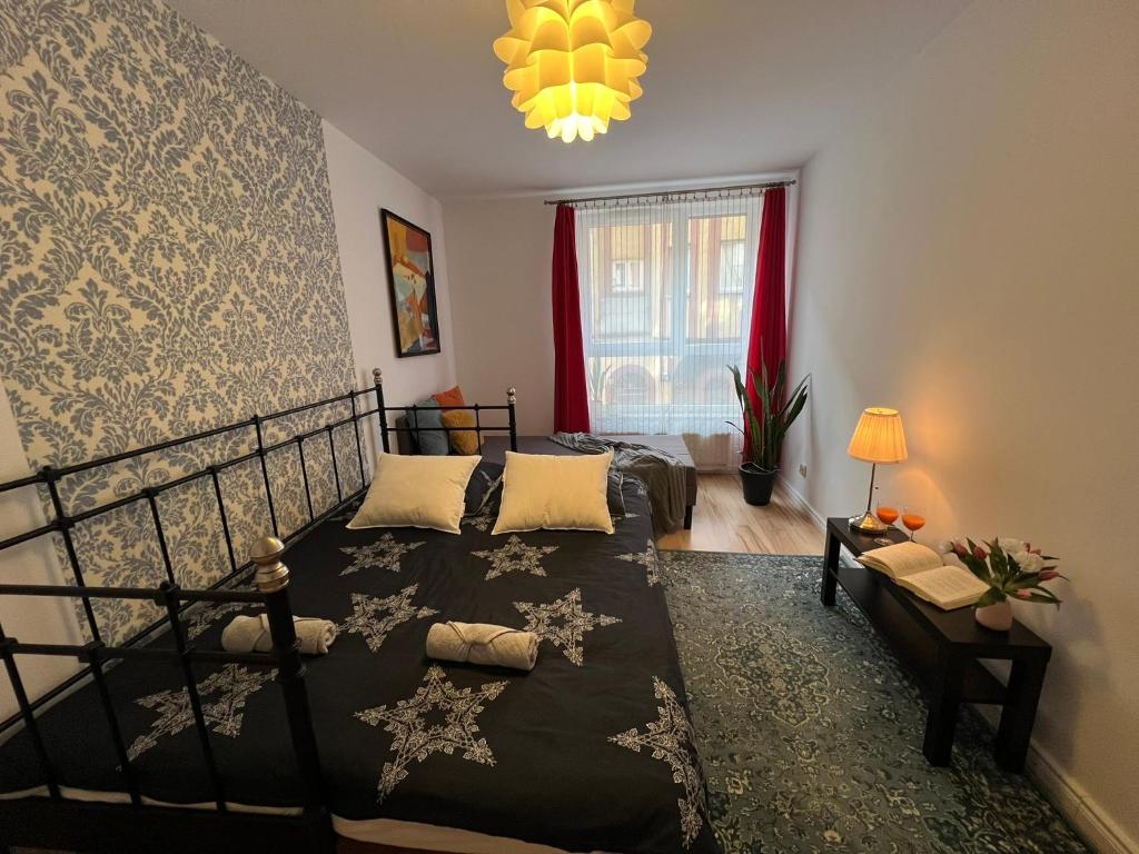 Posteľ alebo postele v izbe v ubytovaní Golden House