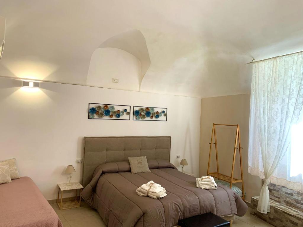 Postel nebo postele na pokoji v ubytování B&B Vinci