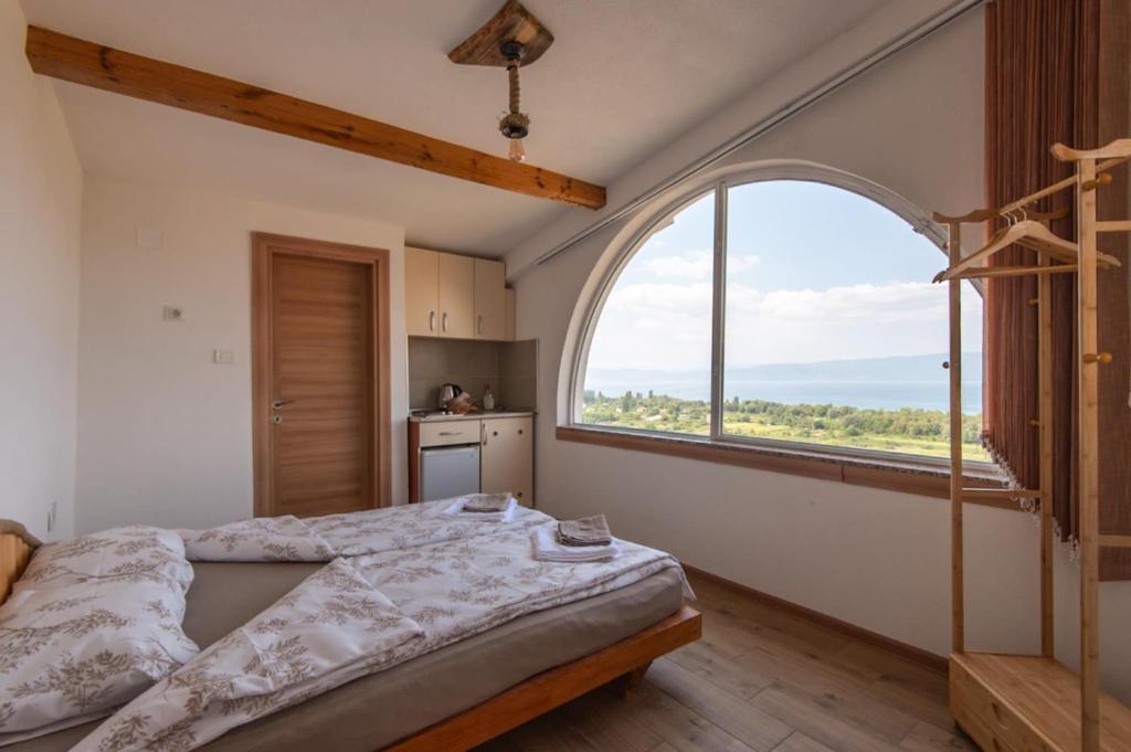 Ένα ή περισσότερα κρεβάτια σε δωμάτιο στο Villa Koren