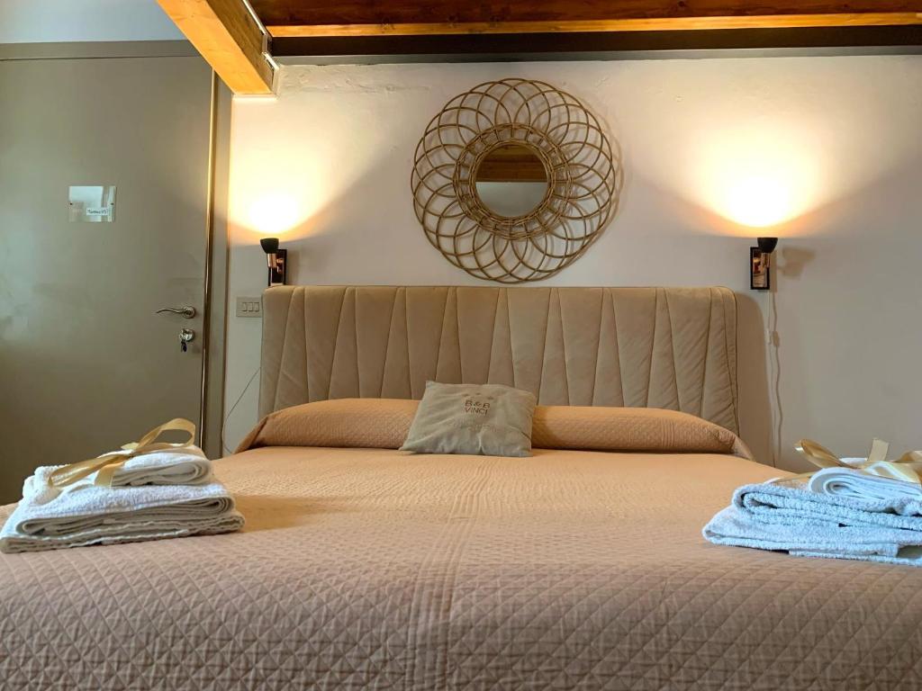 Postel nebo postele na pokoji v ubytování B&B Vinci