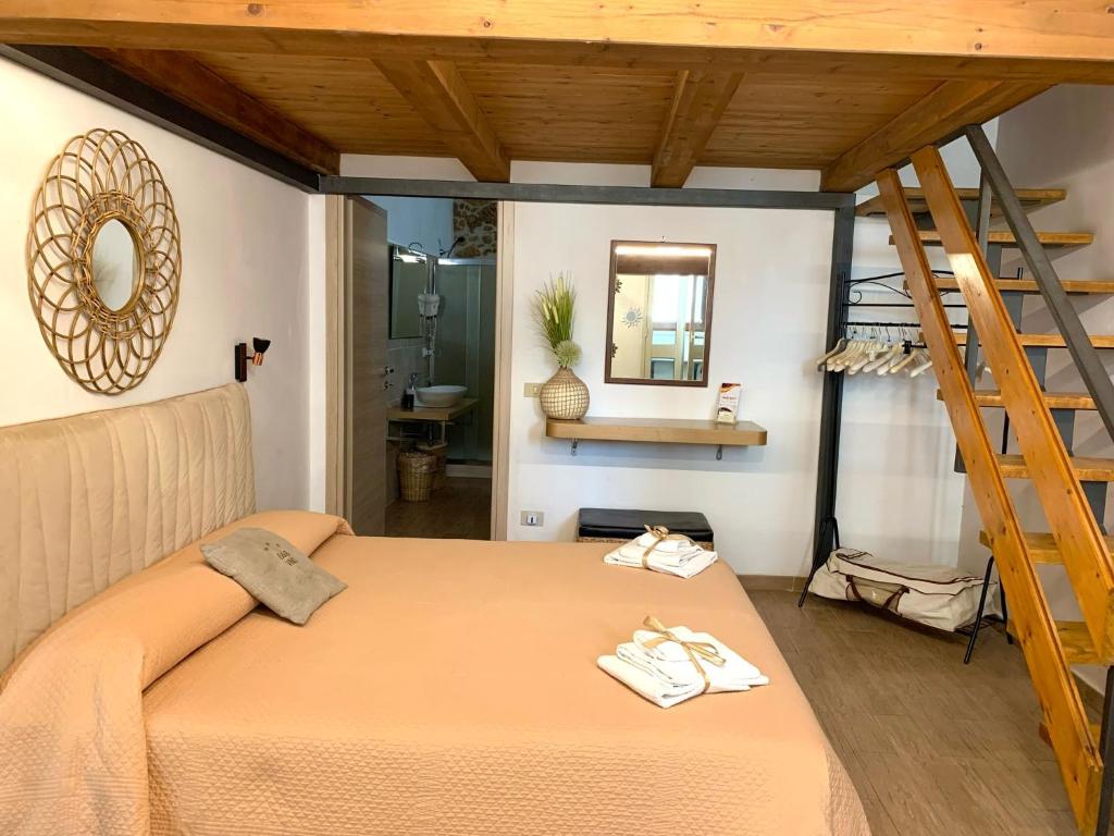 Postel nebo postele na pokoji v ubytování B&B Vinci