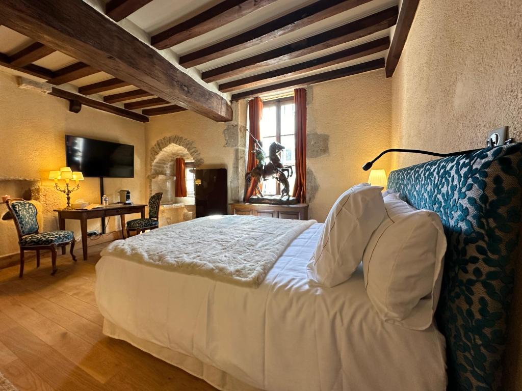 Postel nebo postele na pokoji v ubytování Gite, chambre d hôte L échoppe est belle