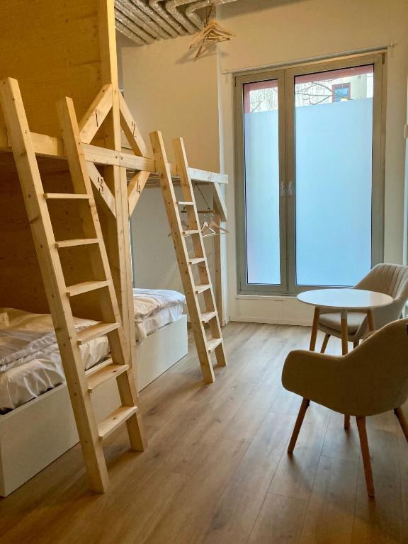 Postel nebo postele na pokoji v ubytování Minimal Hostel Kreuzberg