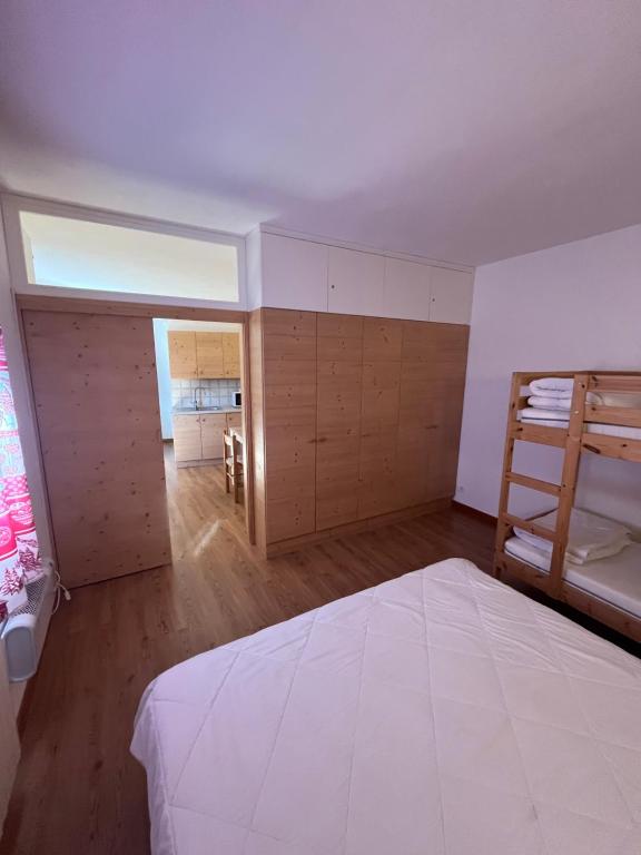 Łóżko lub łóżka w pokoju w obiekcie Casa Mammolo Falcade