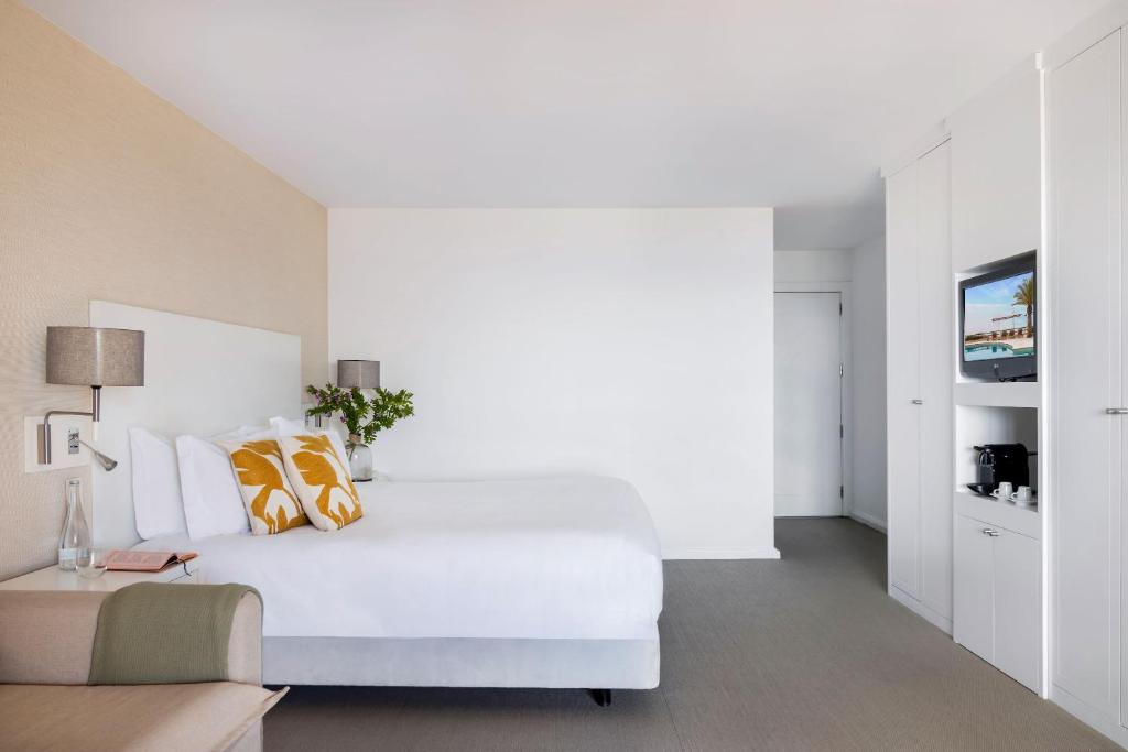 Un ou plusieurs lits dans un hébergement de l'établissement Vilalara Grand Hotel Algarve
