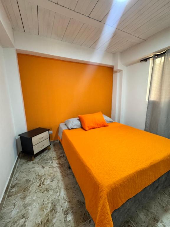 Postel nebo postele na pokoji v ubytování El guadual apartahotel
