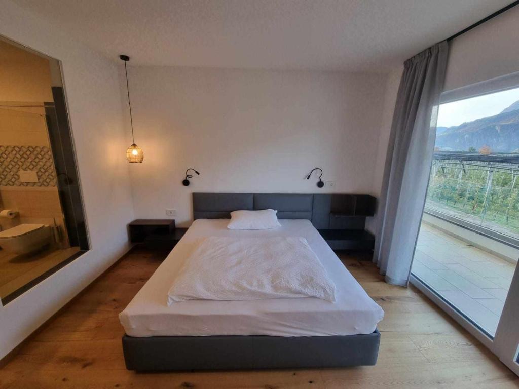 Postel nebo postele na pokoji v ubytování Pitla Cuna Eco Relais