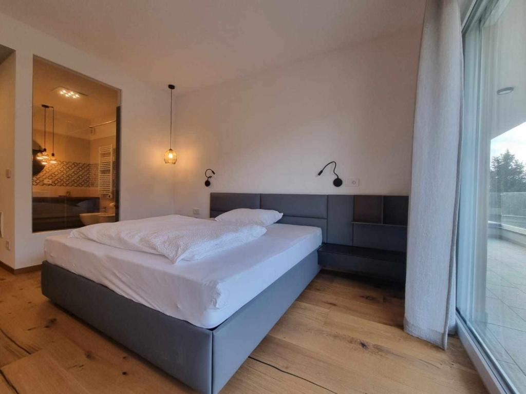 Postel nebo postele na pokoji v ubytování Pitla Cuna Eco Relais