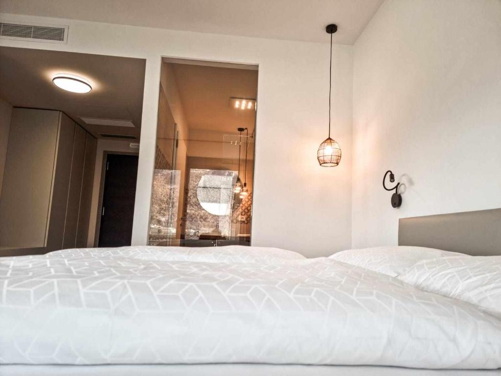 Postel nebo postele na pokoji v ubytování Pitla Cuna Eco Relais