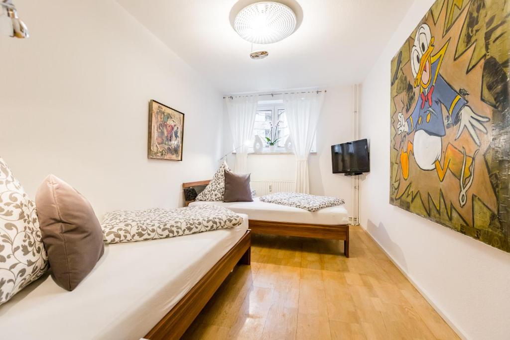 Llit o llits en una habitació de Ferien Und Messewohnug