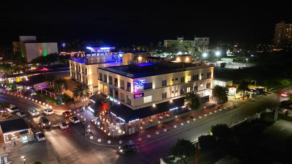 an aerial view of a city at night at The Cove Aruba by Bocobay in Palm-Eagle Beach