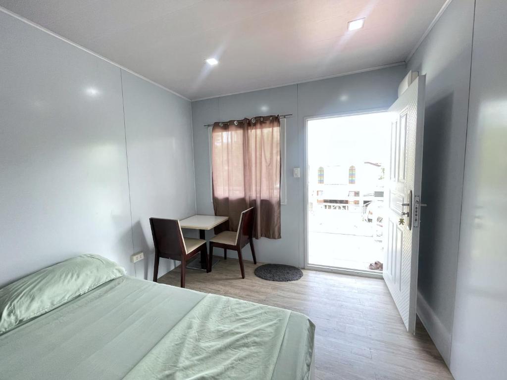 Postel nebo postele na pokoji v ubytování A Residences
