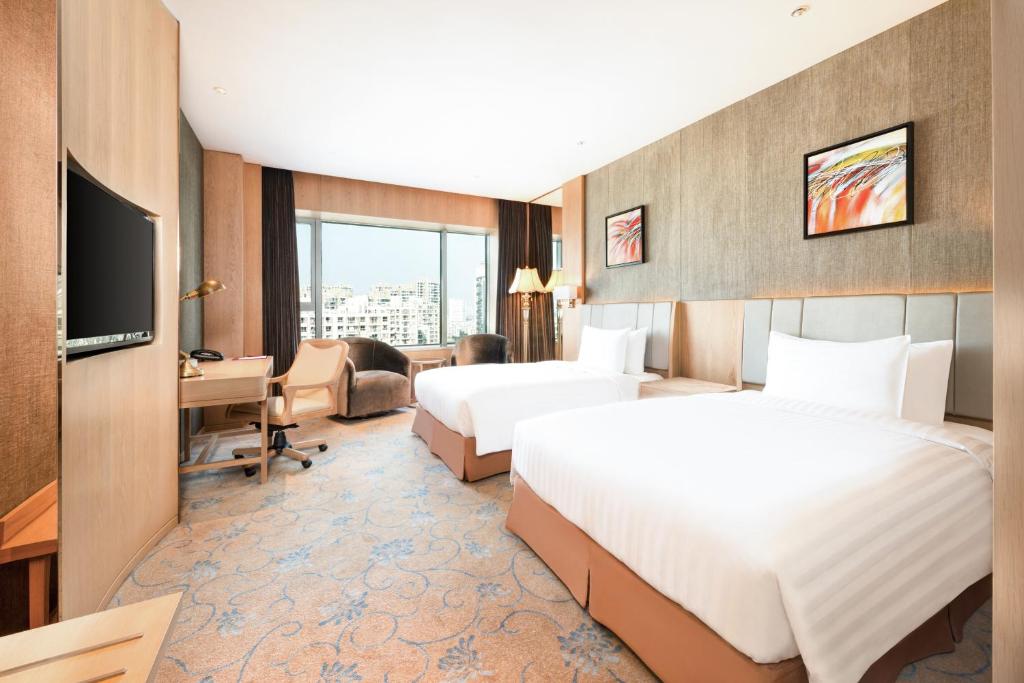 Postel nebo postele na pokoji v ubytování Crowne Plaza Shanghai Noah Square by IHG