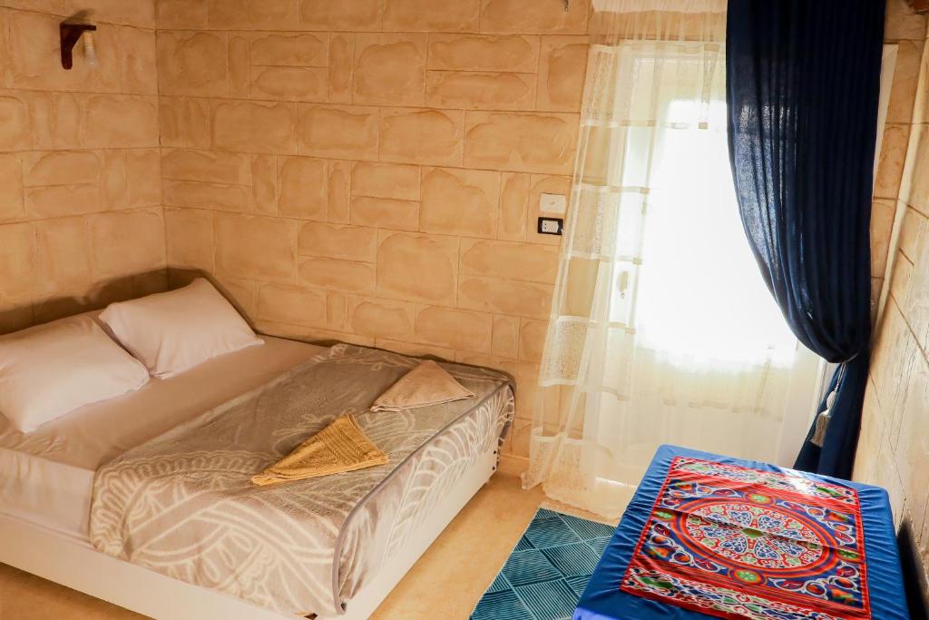 Postel nebo postele na pokoji v ubytování Nubian Hights guesthouse