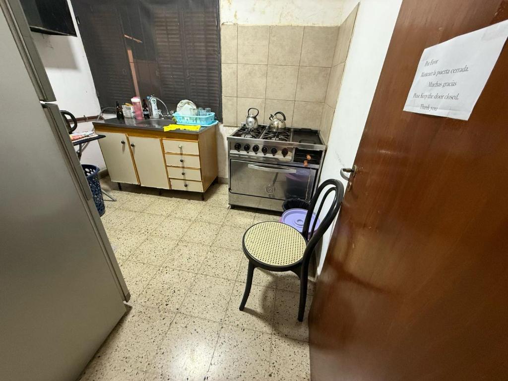 Kuchyň nebo kuchyňský kout v ubytování Hostel Vicente