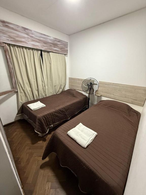 Postel nebo postele na pokoji v ubytování Hostel Vicente