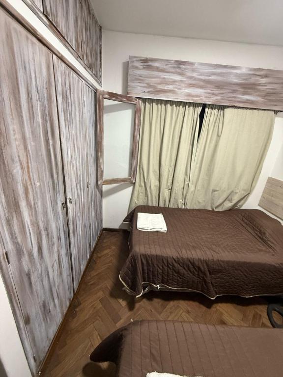 Postel nebo postele na pokoji v ubytování Hostel Vicente