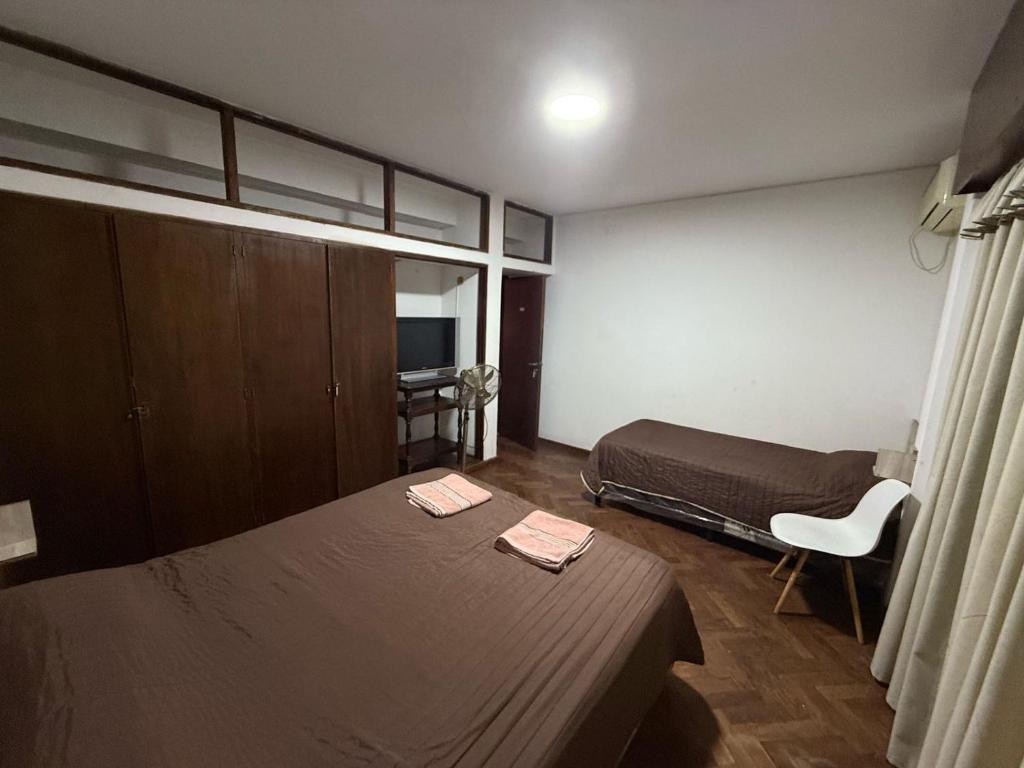 Postel nebo postele na pokoji v ubytování Hostel Vicente