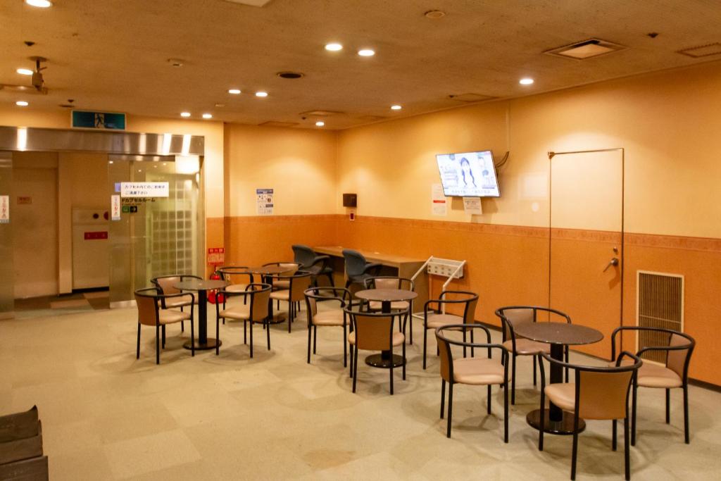 Posezení v ubytování Capsule Hotel Asahi Plaza Shinsaibashi - Men's Only