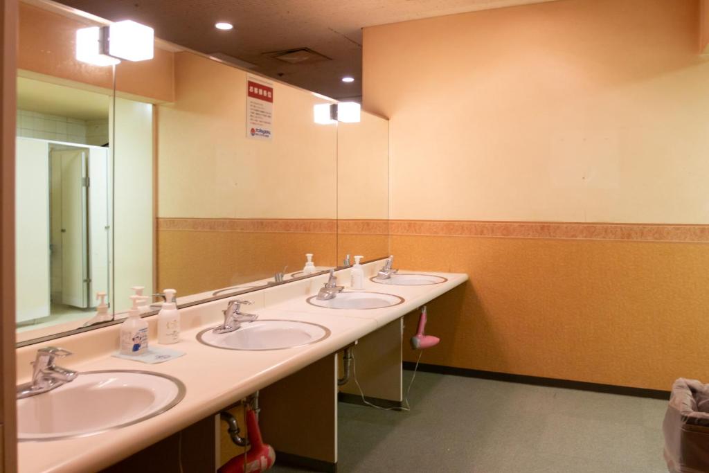 Koupelna v ubytování Capsule Hotel Asahi Plaza Shinsaibashi - Men's Only