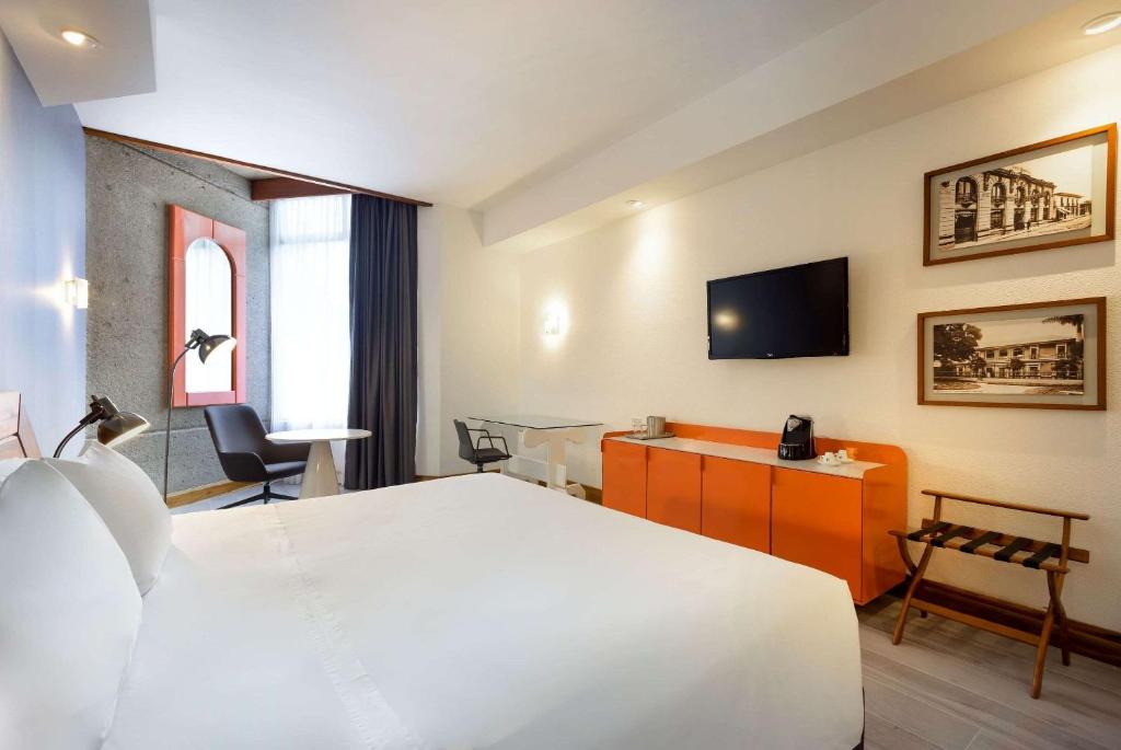 TV a/nebo společenská místnost v ubytování Radisson San Jose-Costa Rica