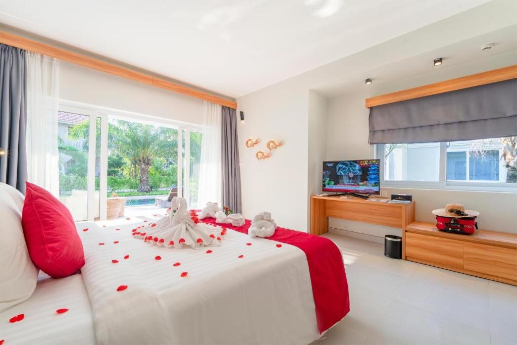 Postel nebo postele na pokoji v ubytování Mercury Phu Quoc Resort & Villas