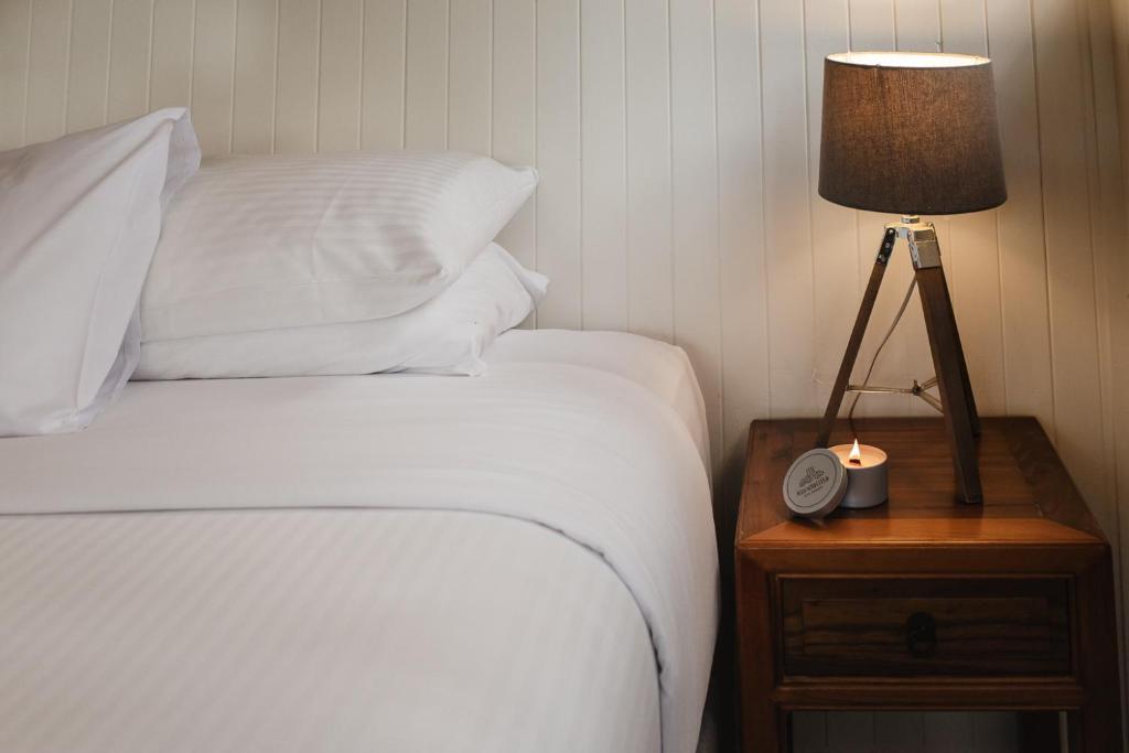 Postel nebo postele na pokoji v ubytování Kondalilla Eco Resort