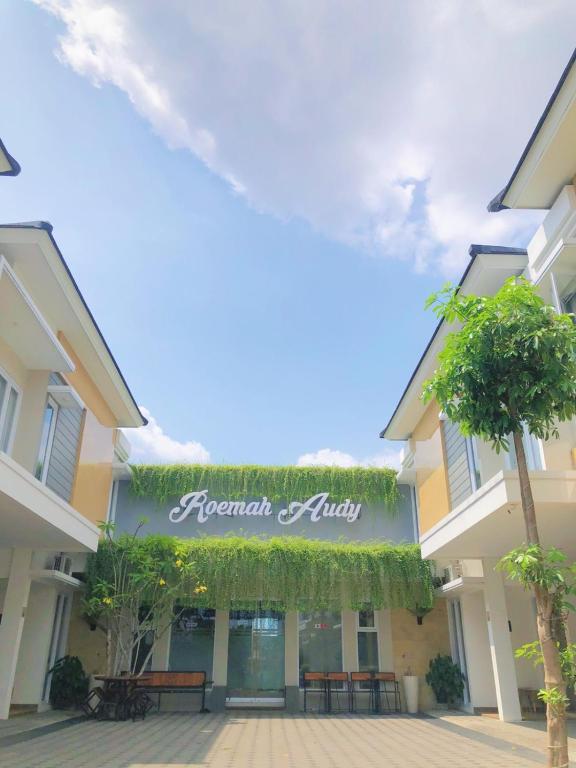 a building with a sign that reads regent hotel at Roemah Audy in Yogyakarta