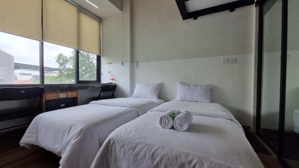 Postel nebo postele na pokoji v ubytování Guest House 555 NKI