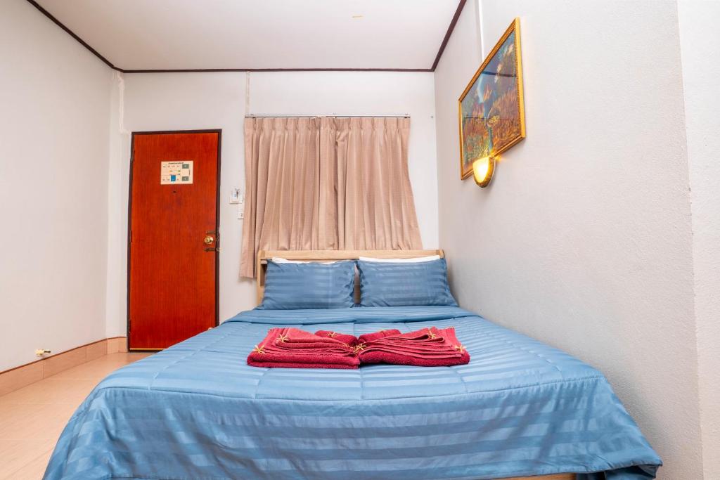 Postel nebo postele na pokoji v ubytování Phumthada Rommanee Krabi Resort