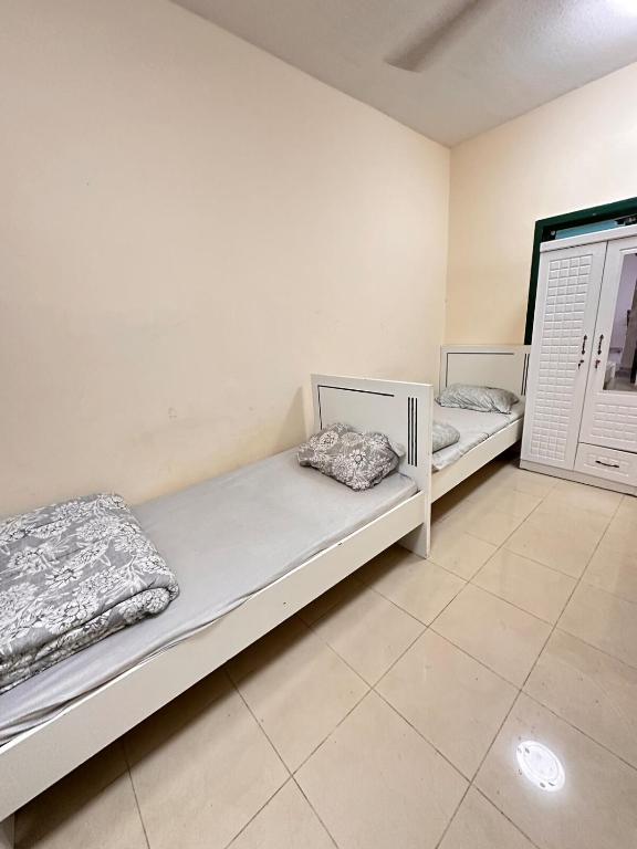 Postel nebo postele na pokoji v ubytování Apartment for rent 2BK in Ajman