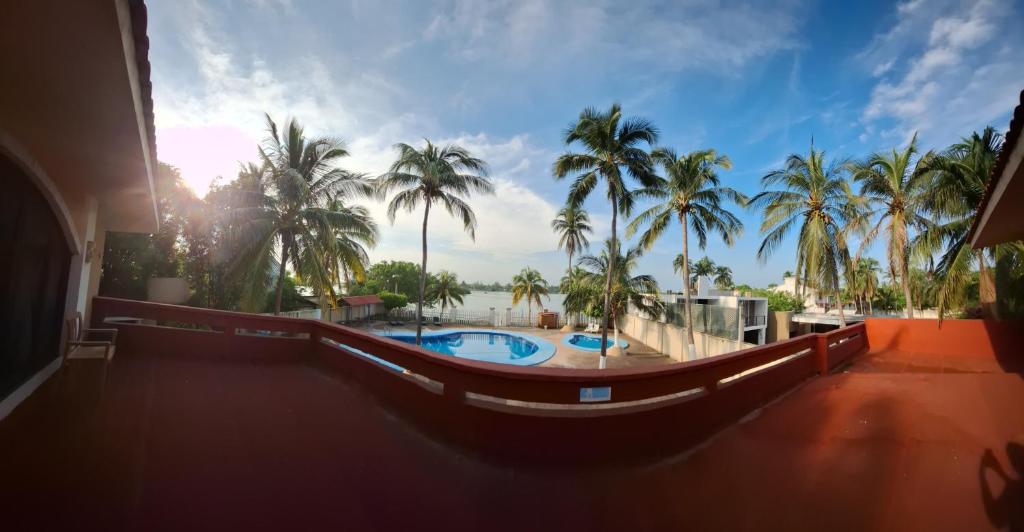 Bazén v ubytování Hotel Gran Palmeiras nebo v jeho okolí