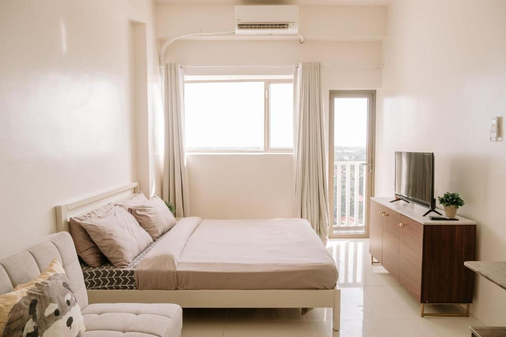 Ένα ή περισσότερα κρεβάτια σε δωμάτιο στο Your Serene City Hideaway