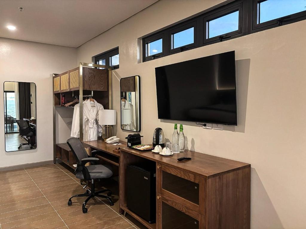 TV a/nebo společenská místnost v ubytování Hudor Resort - Bauang, La Union