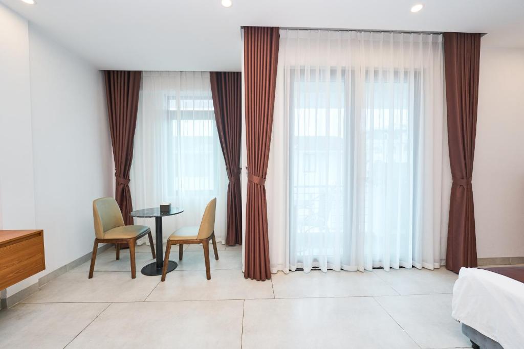 Postel nebo postele na pokoji v ubytování Swan Motel