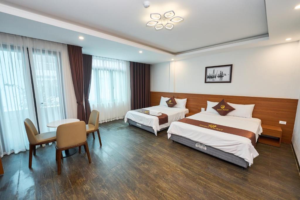 Postel nebo postele na pokoji v ubytování Swan Motel