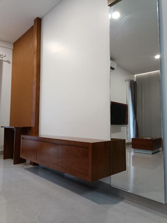 TV a/nebo společenská místnost v ubytování Rauda Living Space Syariah
