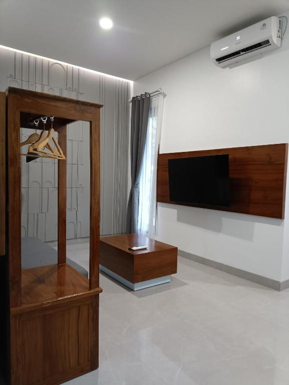 TV a/nebo společenská místnost v ubytování Rauda Living Space Syariah