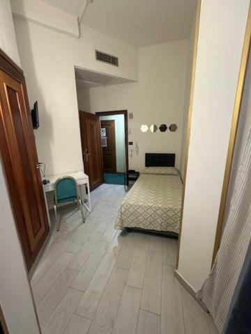 Postel nebo postele na pokoji v ubytování Hotel Europa