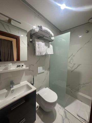 Koupelna v ubytování Hotel Europa