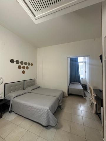 Postel nebo postele na pokoji v ubytování Hotel Europa
