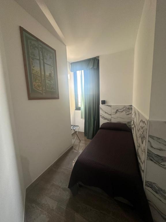 Postel nebo postele na pokoji v ubytování Hotel Europa