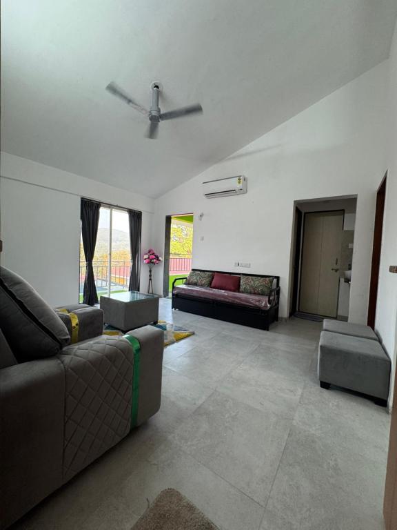 Posezení v ubytování Cozy 1BHK Apartment - Casa Asud