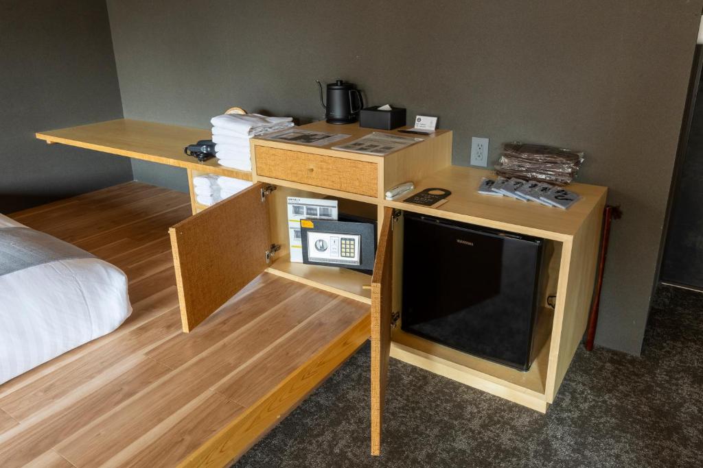 Kuchyň nebo kuchyňský kout v ubytování HOTEL TOMOS ASAKUSA