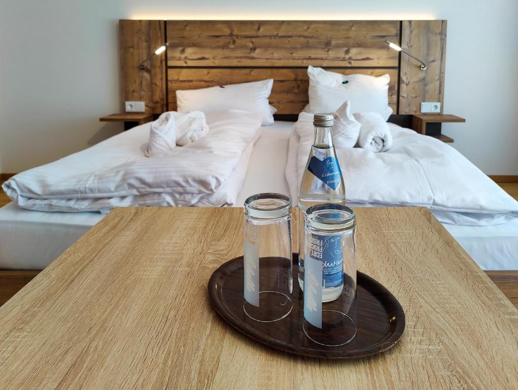 Postel nebo postele na pokoji v ubytování Hotel Bayerischer Wald HFVI