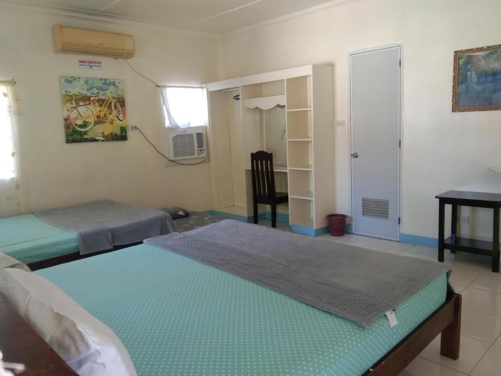 Postel nebo postele na pokoji v ubytování Mayet Beach Resort